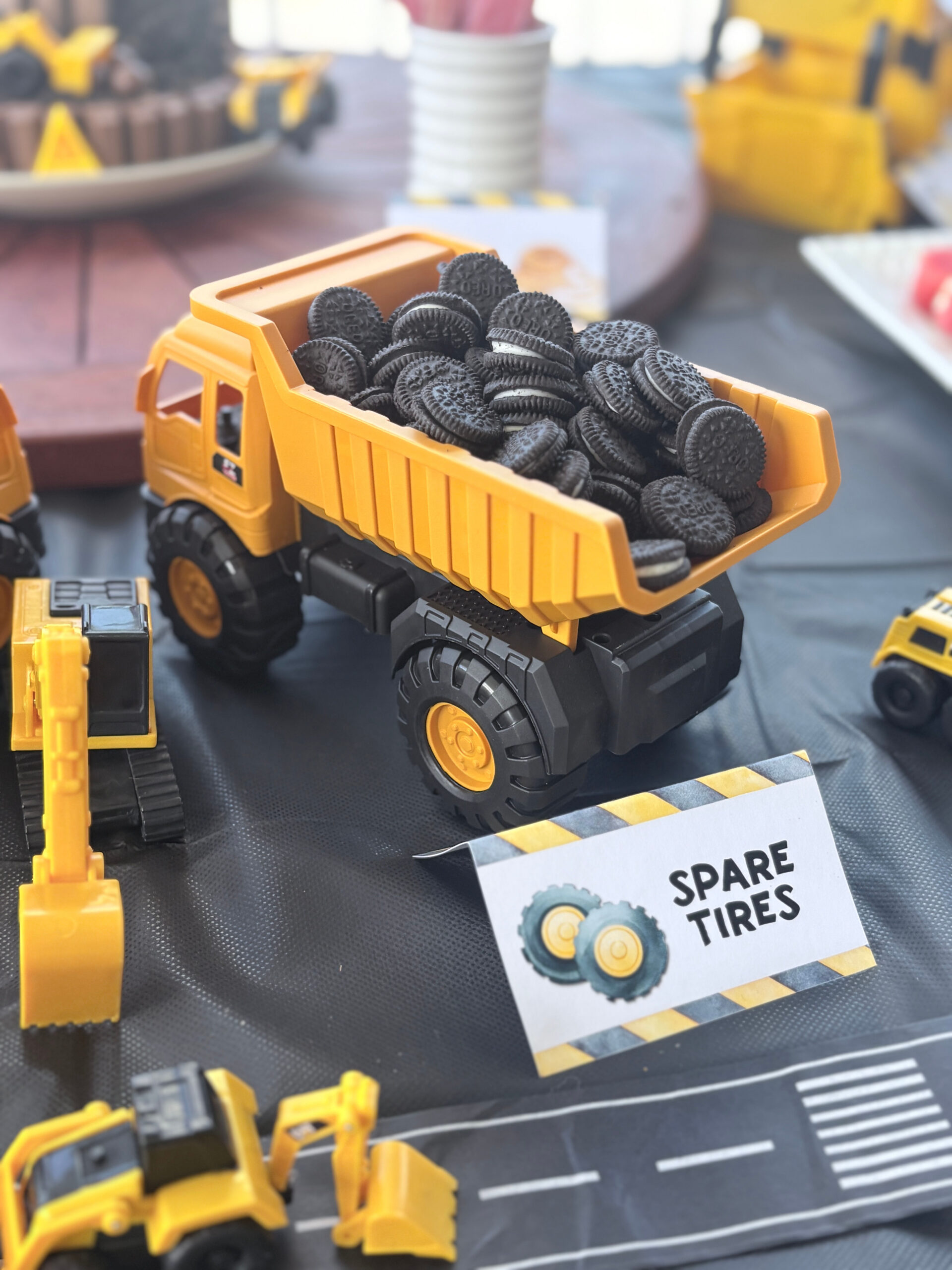 Construction Truck Party Food Ideas Kids Will Love Spare Tires - Mini Oreos served in Dump Truck