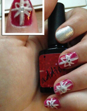 Red and Silver Christmas Present Nails Feature Image