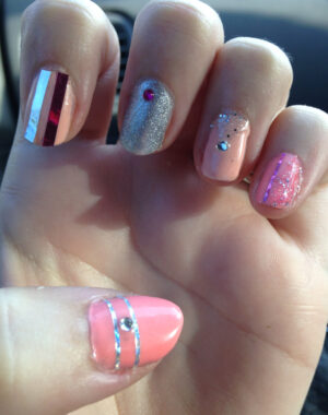 Blinged Out Girly Pink Nails Feature Image