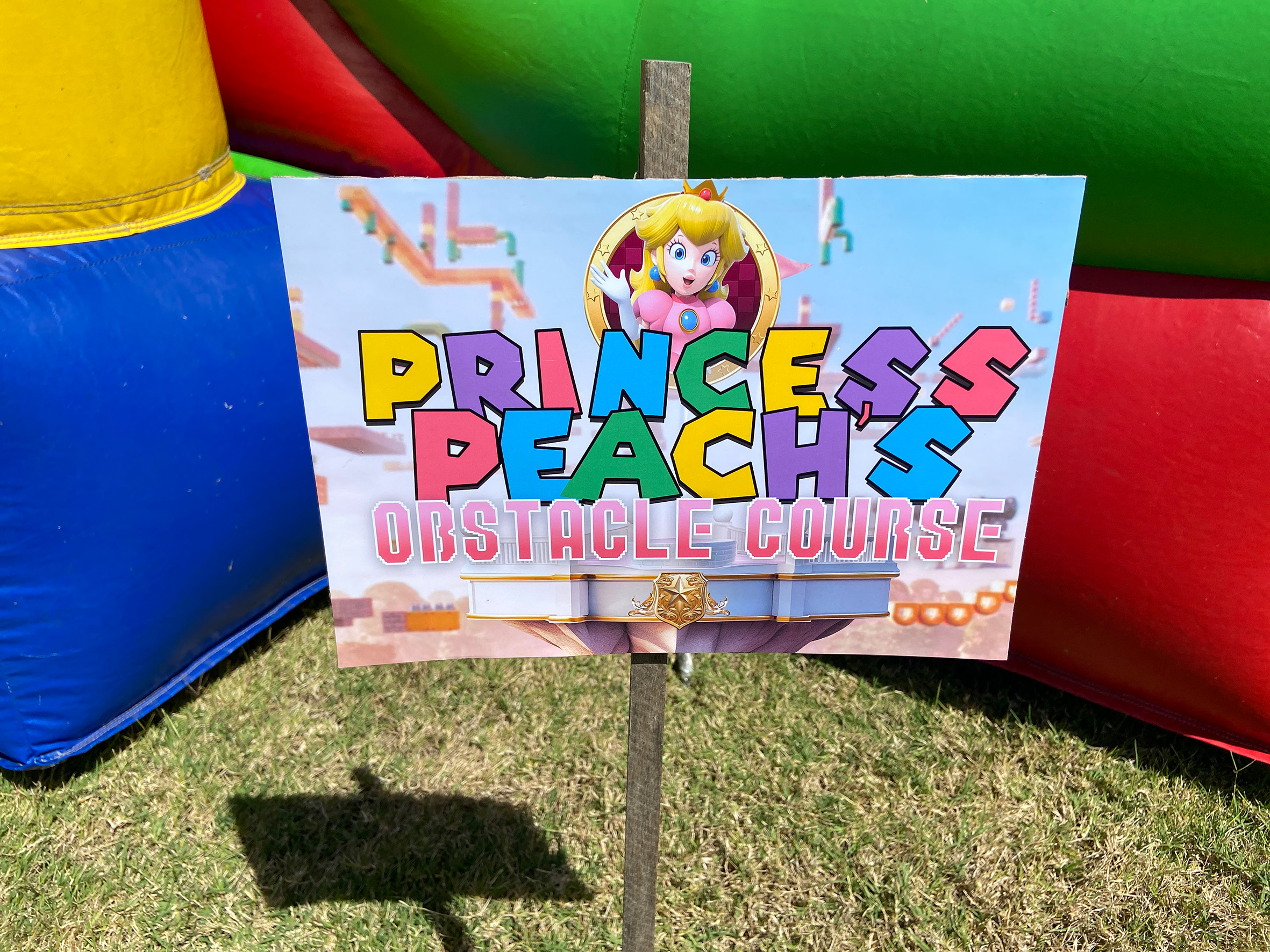 Princess Peach's Obstacle Course Sign for Jumping Castle
